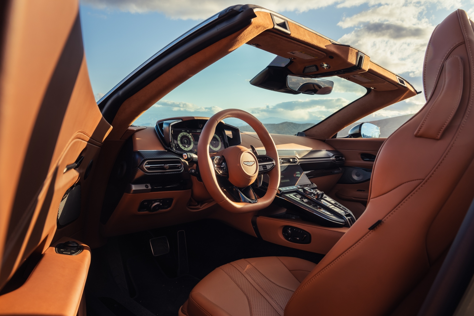 wide shot of the interior of the 2026 Aston Martin Vantage roadster, in tan leather